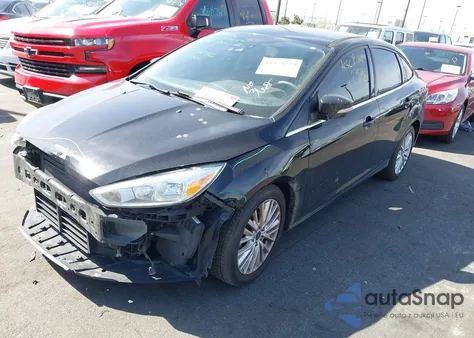 2016 Ford Focus Titanium z USA, uszkodzony, nr VIN 1FADP3J20GL362231